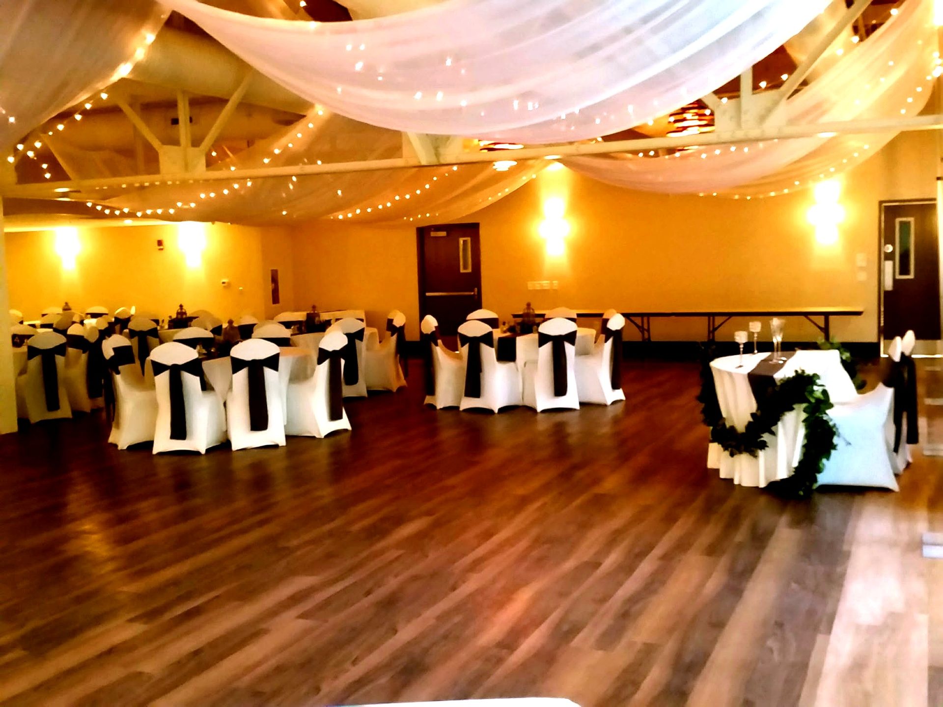 Ceiling drapery — tent drape laced with warm twinkle lights, by Altitude Event Design and Decor, Tampa Bay