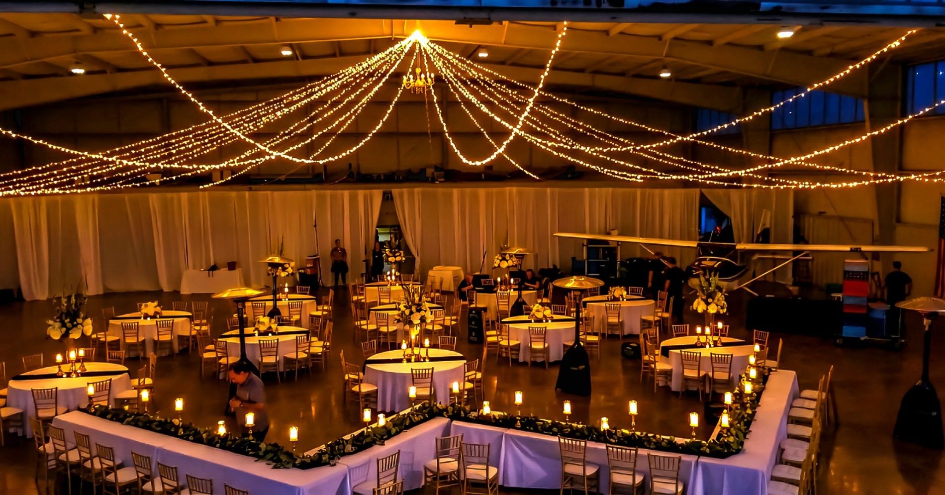 Twinkle and market lights — a canopy of lights end to end, by Altitude Event Design and Decor, Tampa Bay